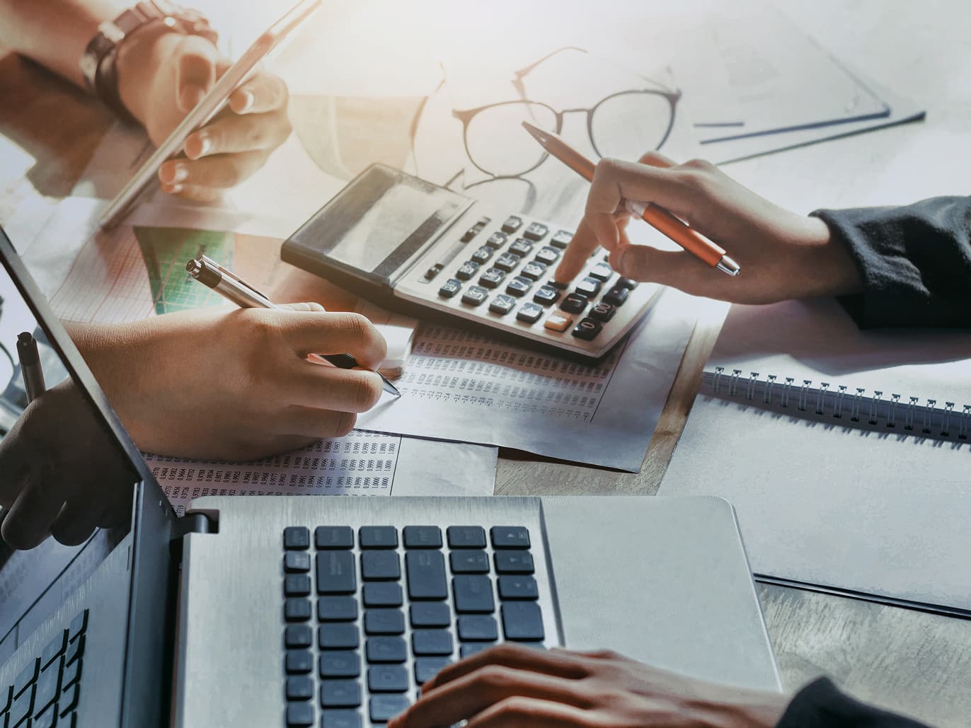 A calculator and CPF statement on a table